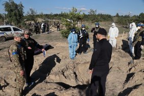 Поліція ексгумувала перші 20 тіл на місці масового поховання в Лимані – голова Нацполіції