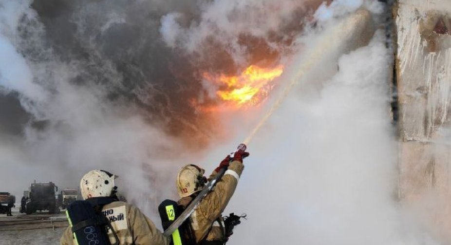 A warehouse with trucks burned down in Russian Magadan