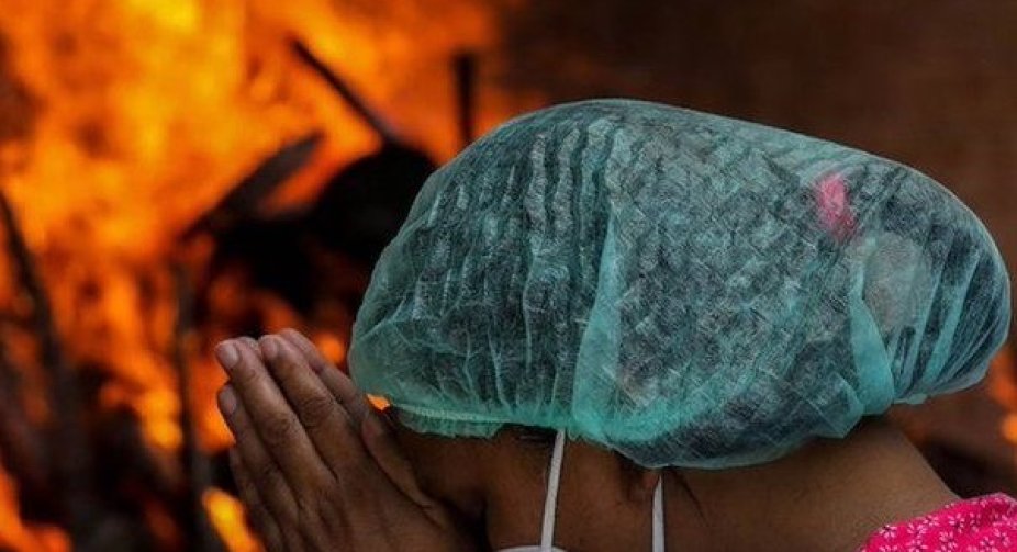 India records 300,000 Covid deaths as pandemic rages