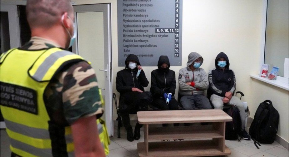 Lithuania votes to curb influx of migrants from Belarus