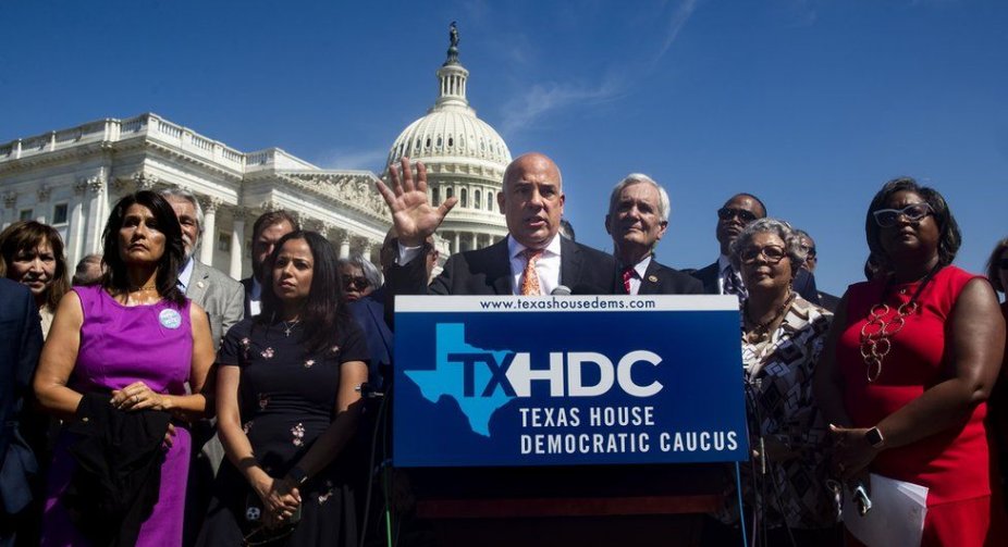 Texas Democrats defy arrest threats after fleeing to block voting law