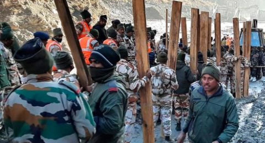 India glacier burst: Rescue workers looking for 180 people feared dead in Uttarakhand