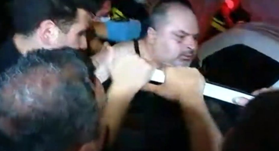 Irakli Absandze, the host of the Georgian 1TV, was detained at a rally in front of the Georgian Dream office