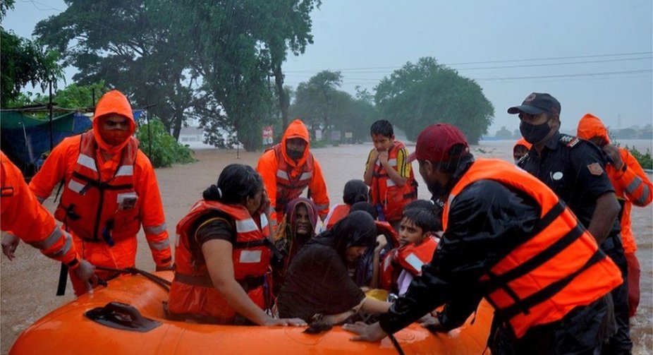 Rescuers search for survivors after heavy rains