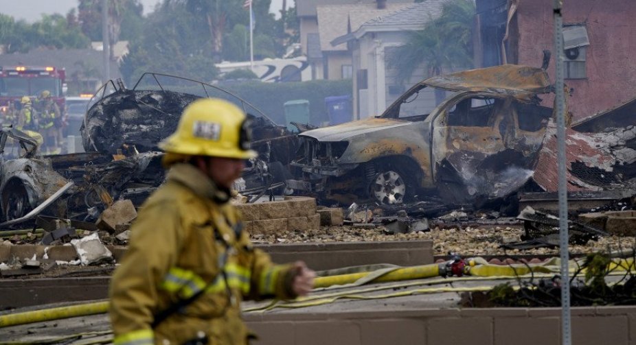 In the United States, a plane crashed into apartment buildings near a school campus