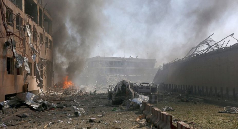 Explosions and gunfire near military hospital in Kabul, killing 19 people